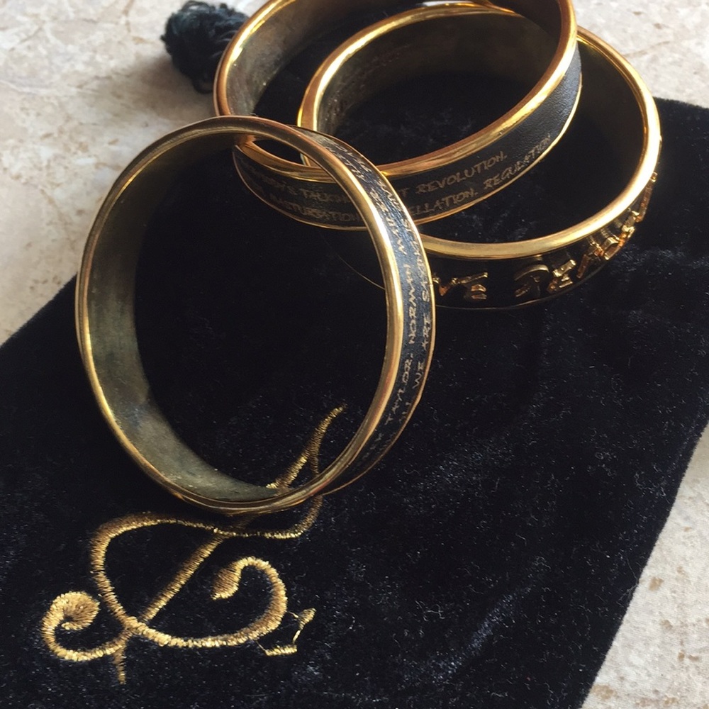 Lyric Jeans  bangles with leather in pouch.